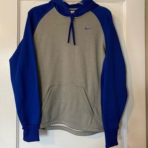 Gray Nike sweatshirt with royal blue hood and sleeves